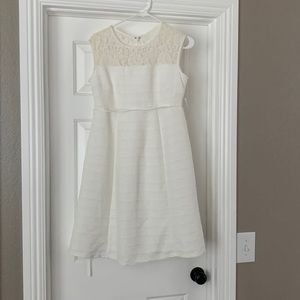 New with tags. Maternity dress. White.  Size small